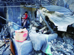 Israeli strikes in Gaza kill 104, health ministry says, after Hamas accused of killing soldier