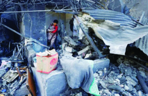 Israeli strikes in Gaza kill 104, health ministry says, after Hamas accused of killing soldier